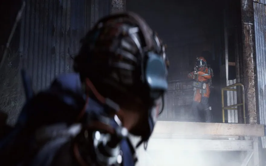 Two armored Raiders in a dark industrial setting from ARC Raiders